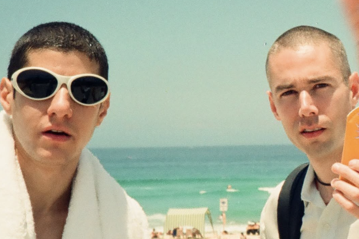 Beastie Boys' MCA (Adam Yauch) and Mike D at the beach in a photo featured in the documentary The Best Summer.